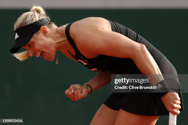Angelique Kerber of Germany celebrates against Magdalena Frech of Poland during the Women's Singles First Round match on Day 2 of The 2022 French...
