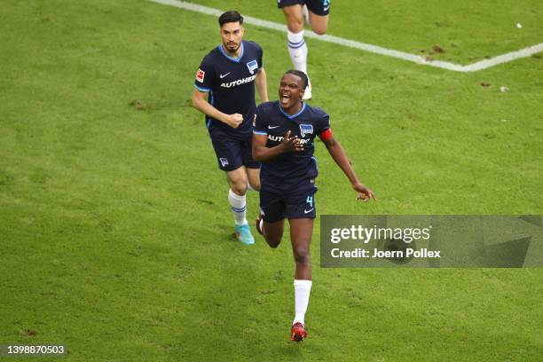 Anga Dedryck Boyata of Hertha Berlin celebrates after scoring their team's first goal during the Bundesliga Playoffs Leg Two match between Hamburger...