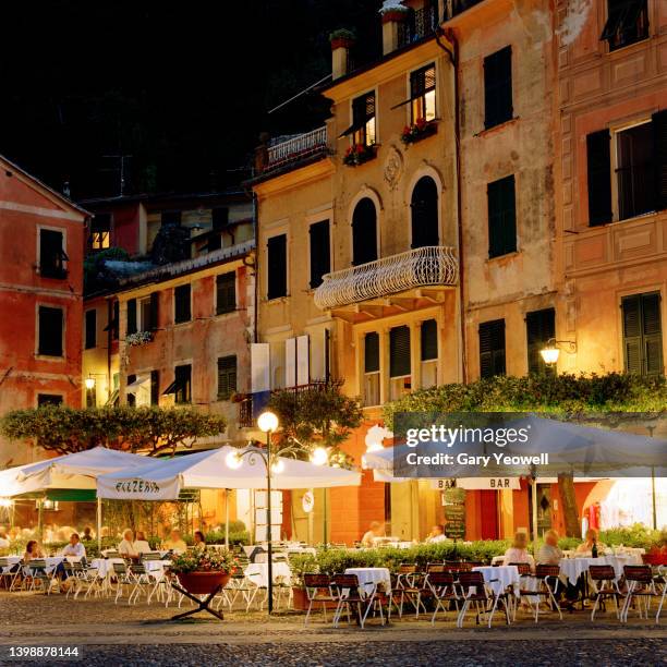 people dining outside in piazza in portofino - genoa italy photos et images de collection