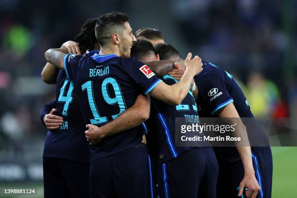 Anga Dedryck Boyata, Stevan Jovetic and Lucas Tousart of Hertha Berlin celebrate their team's second goal scored by Marvin Plattenhardt during the...