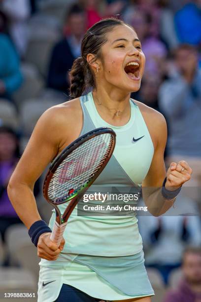 Emma Raducanu of Great Britain celebrates winning match point during the Women's Singles First Round match against Linda Noskova of Czech Republic on...