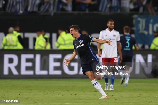 Marc Oliver Kempf of Hertha Berlin celebrates their team's victory at full-time after the Bundesliga Playoffs Leg Two match between Hamburger SV and...