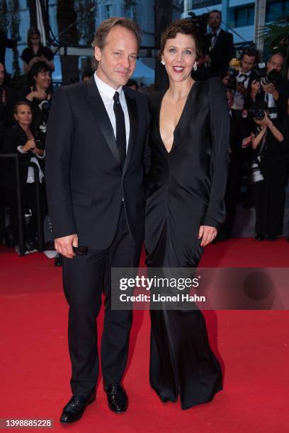 Peter Sarsgaard and Maggie Gyllenhaal attend the screening of "Crimes Of The Future" during the 75th annual Cannes film festival at Palais des...
