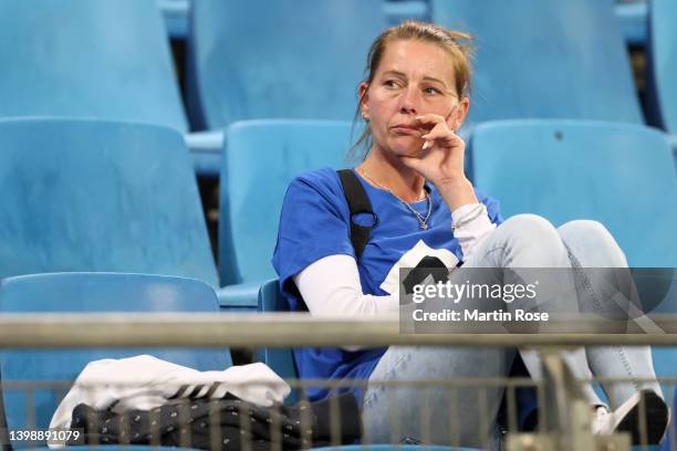 Fan of Hamburger SV looks dejected at full-time after their team's defeat during the Bundesliga Playoffs Leg Two match between Hamburger SV and...