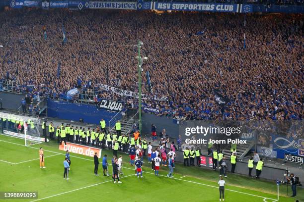 Players of Hamburg SV interact with their fans who show their support at full-time after their team's defeat in the Bundesliga Playoffs Leg Two match...