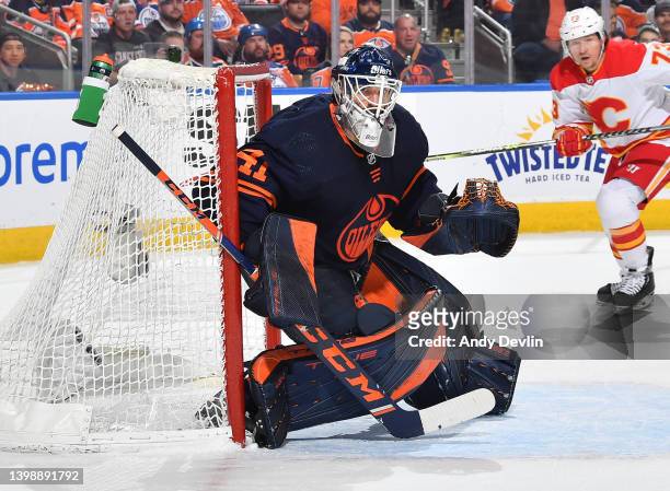 May 22: Mike Smith of the Edmonton Oilers watches the play during Game Three of the Second Round of the 2022 Stanley Cup Playoffs against the Calgary...