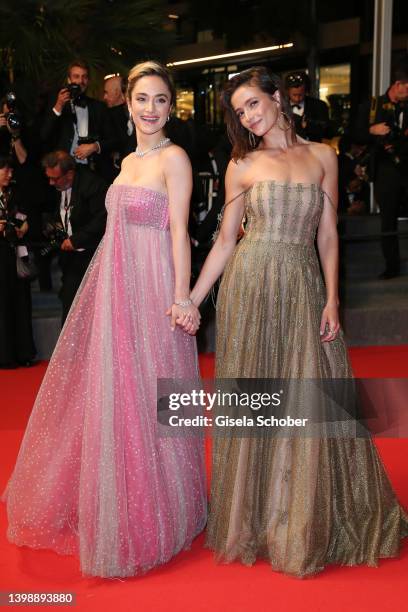 Denise Capezza and Lihi Kornowski depart the screening of "Crimes Of The Future" during the 75th annual Cannes film festival at Palais des Festivals...