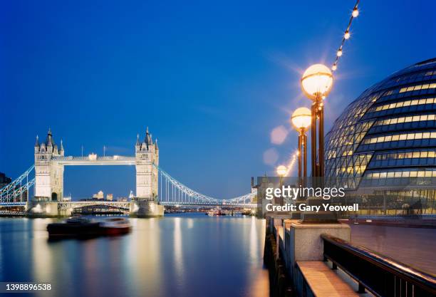 london city skyline with tower bridge in twilight - embankment stock pictures, royalty-free photos & images