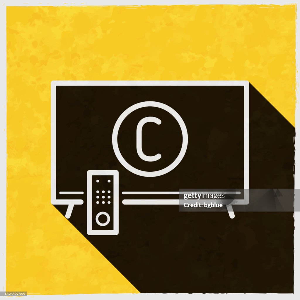 TV avec symbole de copyright. Icône avec une ombre longue sur fond jaune texturé