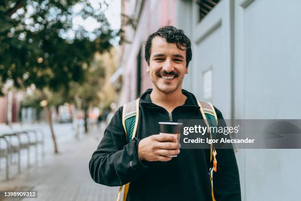 man with takeaway coffee - chile bildbanksfoton och bilder