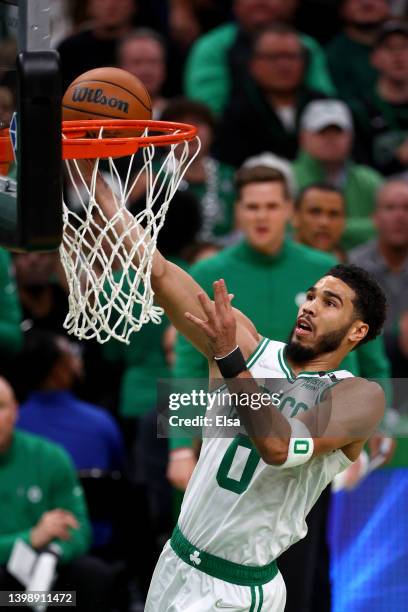 Jayson Tatum of the Boston Celtics shoots a lay up against the Miami Heat during the first quarter in Game Four of the 2022 NBA Playoffs Eastern...