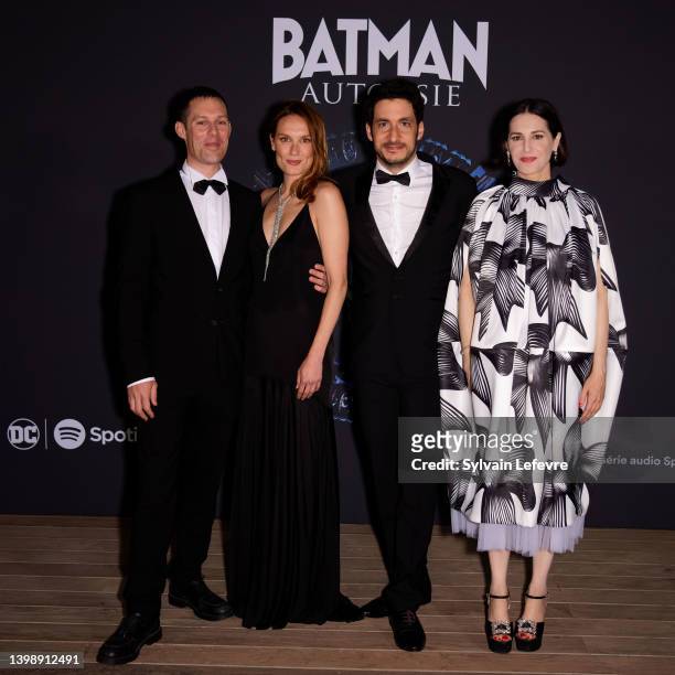 Christophe Montenez, Ana Girardot, Douglas Attal and Amira Casar attend the photocall for "Batman Autopsie" Cocktail during the 75th annual Cannes...