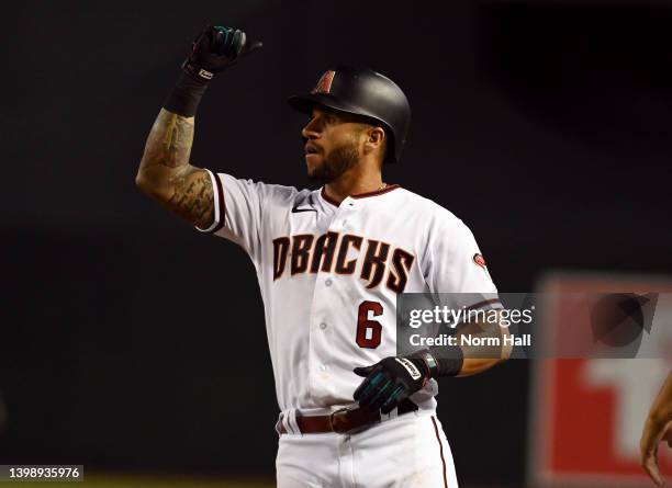 David Peralta of the Arizona Diamondbacks reacts after hitting an RBI single during the seventh inning against the Kansas City Royals at Chase Field...