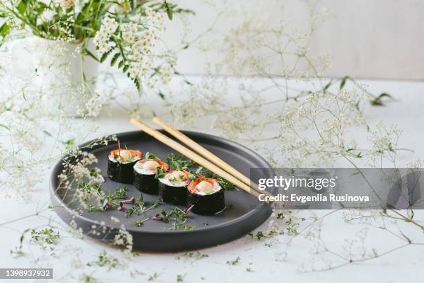 sushi on a gray plate - 皿　和 ストックフォトと画像