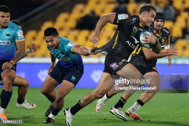 Richard Kahui of Western Force makes a break during the round 10 Super Rugby Pacific match between the Moana Pasifika and the Western Force at Mt...