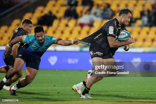 Richard Kahui of Western Force makes a break during the round 10 Super Rugby Pacific match between the Moana Pasifika and the Western Force at Mt...