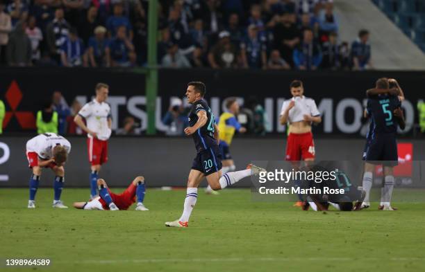 Marc Oliver Kempf of Hertha Berlin celebrates their team's victory at full-time after during the Bundesliga Playoffs Leg Two match between Hamburger...