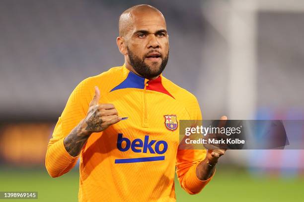 Dani Alves gestures to the crowd during an FC Barcelona training session at Accor Stadium on May 24, 2022 in Sydney, Australia.