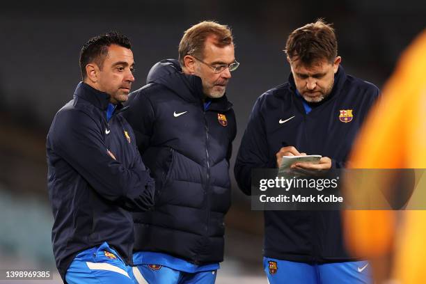 Barcelona Coach Xavi Hernandez looks on during an FC Barcelona training session at Accor Stadium on May 24, 2022 in Sydney, Australia.