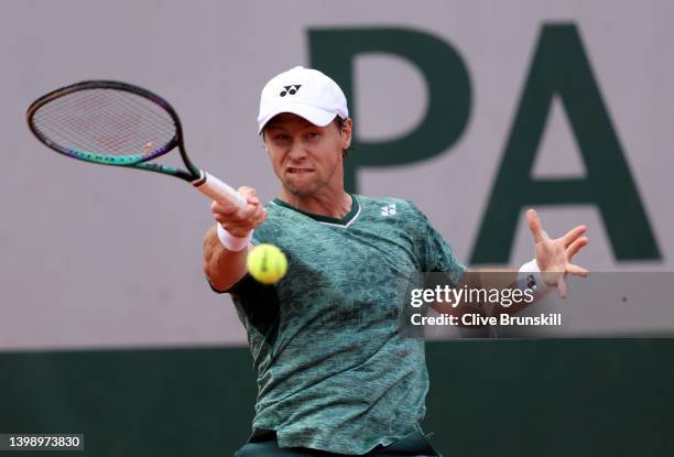 Ricardas Berankis of Lithuania plays a forehand against Laslo Djere of Serbia during the Men's Singles First Round match on Day 3 of the French Open...