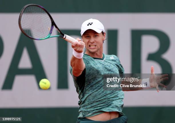 Ricardas Berankis of Lithuania plays a forehand against Laslo Djere of Serbia during the Men's Singles First Round match on Day 3 of the French Open...