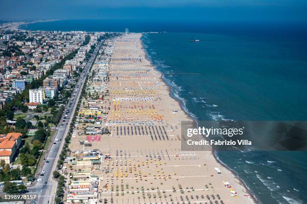 Aerial view, from a helicopter, of the beaches on September 11, 2019 in Rimini, Italy. Italy's nearly 8000 km coastlines and islands stretch across...