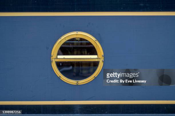round window - barge stock pictures, royalty-free photos & images