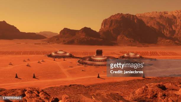 human colony on the mars. rusty mountains in arid climate - space station 個照片及圖片檔