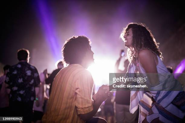proposal on music festival! - dating show stock pictures, royalty-free photos & images