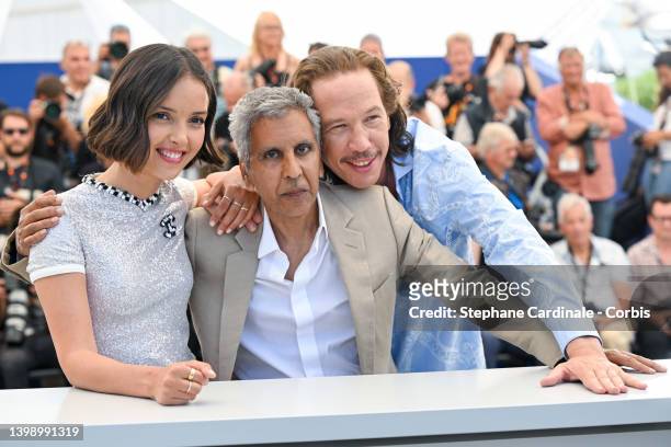 Lyna Khoudri, Director Rachid Bouchareb and Reda Kateb attend the photocall for "Nos Frangins " during the 75th annual Cannes film festival at Palais...