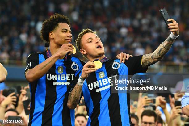 Tajon Buchanan of Club Brugge and Noa Lang of Club Brugge celebrate the title of champion after the Jupiler Pro League Champions Play-off match...