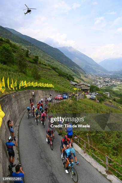 Vincenzo Nibali of Italy and Team Astana – Qazaqstan, Richard Carapaz of Ecuador and Team INEOS Grenadiers Pink Leader Jersey with teammates and The...
