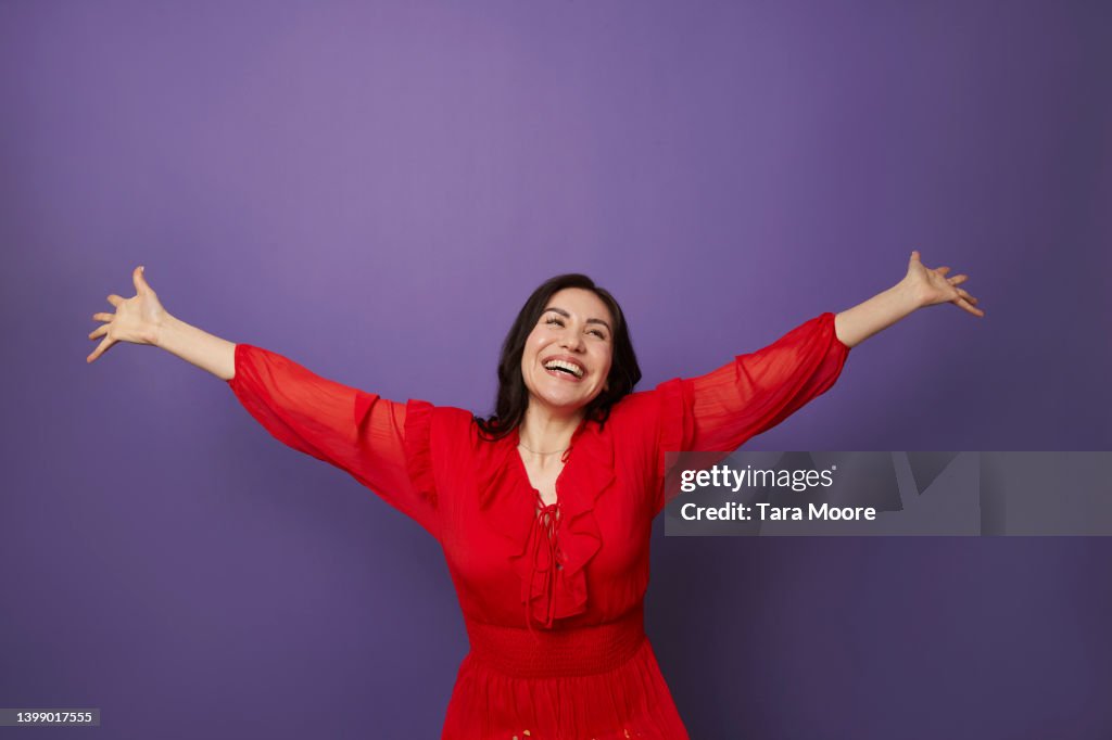 Woman with arms outstretched