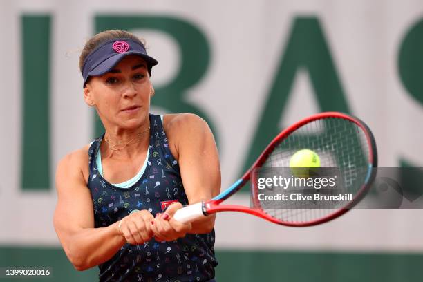 Irina Bara of Romania plays a backhand against Yulia Putintseva of Kazakhstan during the Women's Singles First Round match on Day 3 of the French...