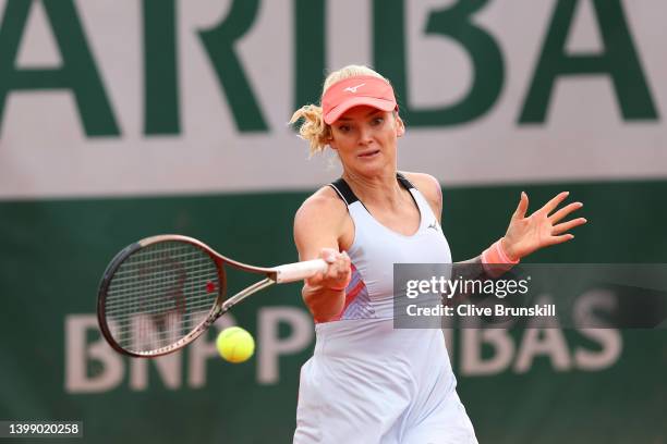 Tereza Martincova of Czech Republic plays a forehand against Shelby Rogers of The United States during the Women's Singles First Round match on Day 3...