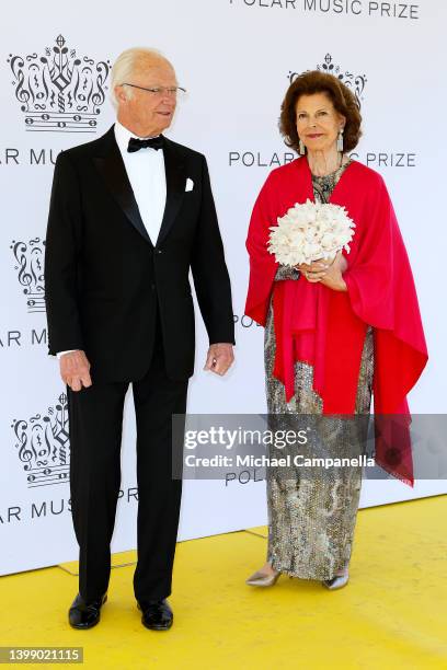 King Carl Gustaf XVI of Sweden and Queen Silvia of Sweden poses on the red carpet during the 2022 Polar Music Prize award ceremony on May 24, 2022 in...