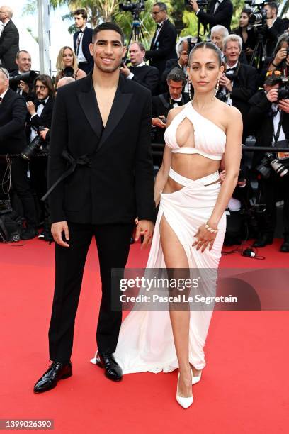 Achraf Hakimi and Hiba Abouk attend the 75th Anniversary celebration screening of "The Innocent " during the 75th annual Cannes film festival at...