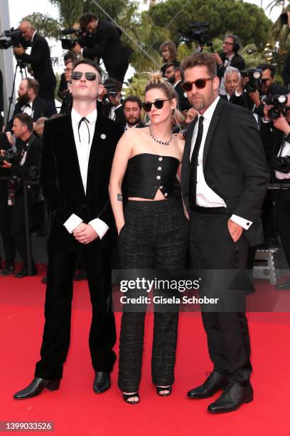 Tom Sturridge, Kristen Stewart, and Scott Speedman attend the 75th Anniversary celebration screening of "The Innocent " during the 75th annual Cannes...