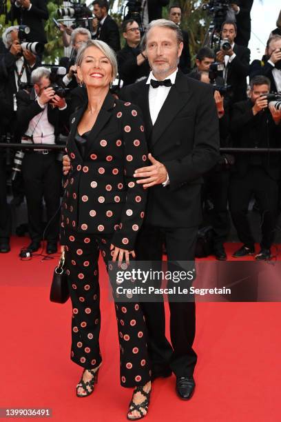 Hanne Jacobsen and Mads Mikkelsen attend the 75th Anniversary celebration screening of "The Innocent " during the 75th annual Cannes film festival at...