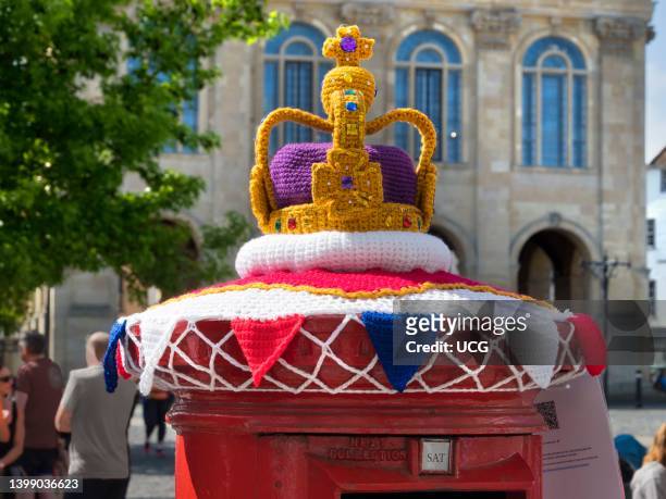 Cute crowned post box celebrating the Queen's Platinum Jubilee in Market Place, Abingdon, UK.
