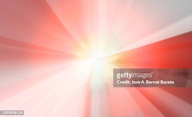 explosion and flash of colored light on a pink background. - colorful background stock pictures, royalty-free photos & images