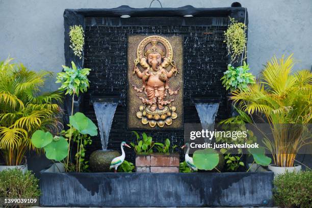 thai fountain with ganesha decor - ganesha buddhist god stock pictures, royalty-free photos & images