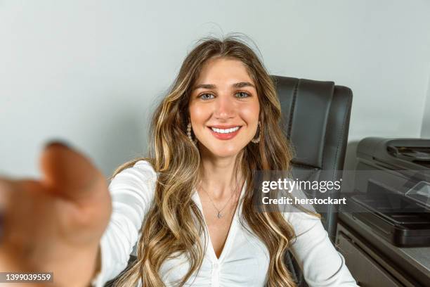 beautiful woman giving online conference - woman selfie stock pictures, royalty-free photos & images