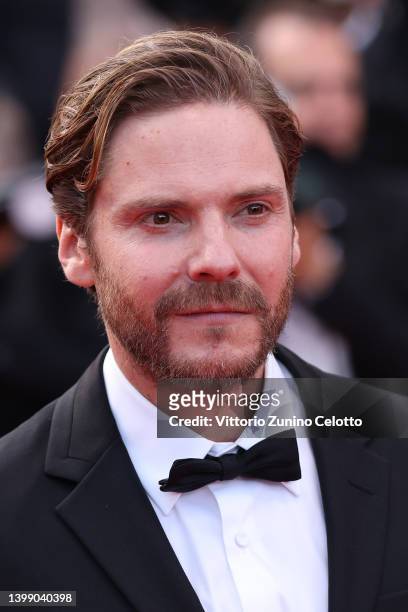 Daniel Brühl attends the 75th Anniversary celebration screening of "The Innocent " during the 75th annual Cannes film festival at Palais des...