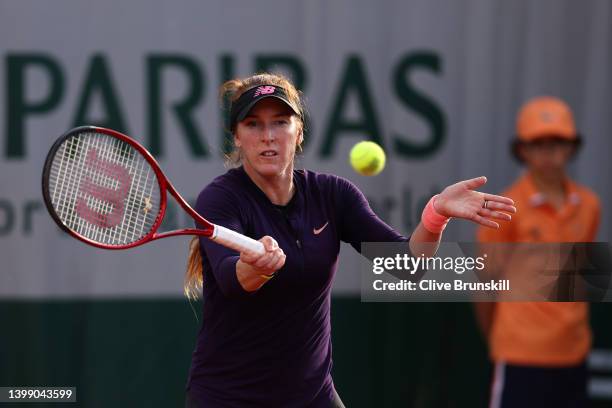 Madison Brengle of USA plays a forehand against Mihaela Buzarnescu of Romania during the Women's Singles First Round match on Day 3 of the French...