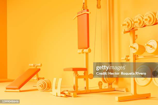 image generated in computer of machines and gym weights with static bicycle, healthy living concept, orange 3d render - 3 gym stock pictures, royalty-free photos & images