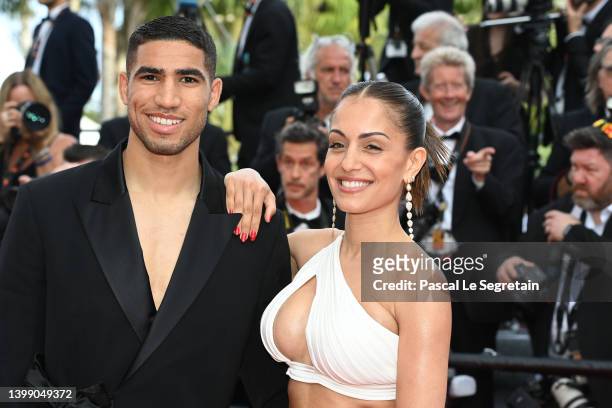 Achraf Hakimi and Hiba Abouk attend the 75th Anniversary celebration screening of "The Innocent " during the 75th annual Cannes film festival at...