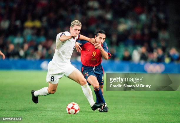 Jose Mari of Spain and Danny Califf of USA in action during the Semi Final of the Olympic soccer match between USA and Spain at Sydney Soccer Stadium...
