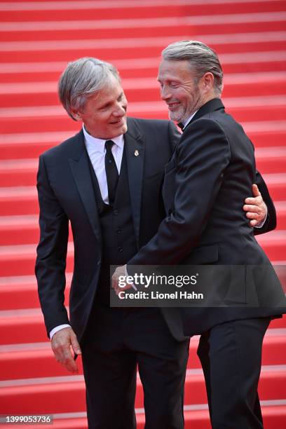 Viggo Mortensen and Mads Mikkelsen attend the 75th Anniversary celebration screening of "The Innocent " during the 75th annual Cannes film festival...