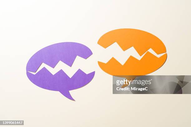 chat bubbles with mouths showing sharp teeth against each other - debate stock pictures, royalty-free photos & images